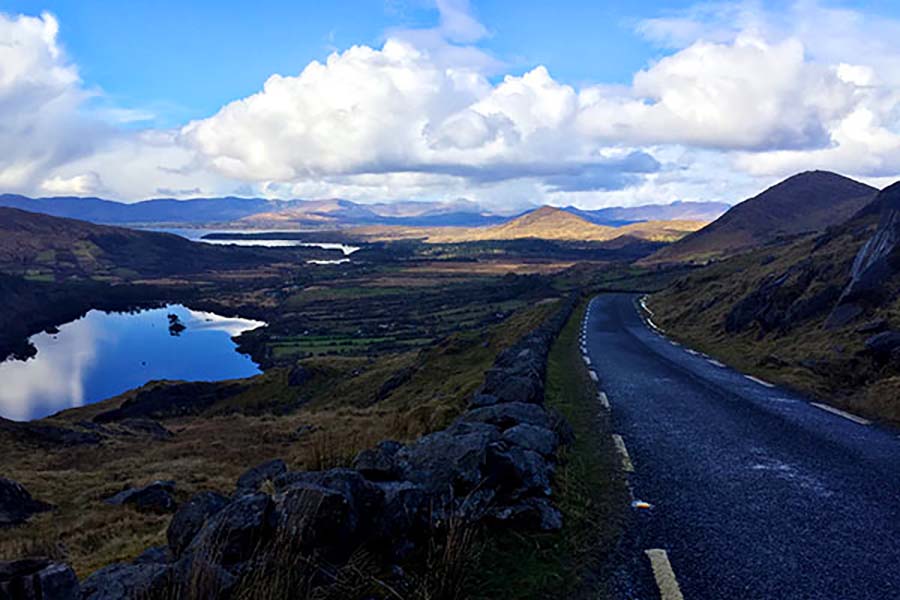 A narrow country road runs through some picturesque part of West Cork 