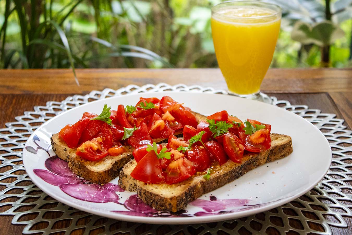 bruschetta with a glass of orange juice