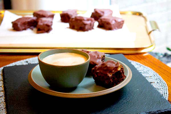 Caramel Chocolate Cake Bars with coffee
