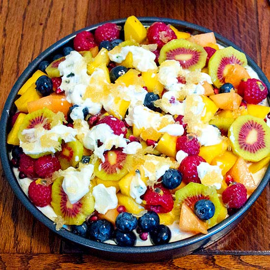 Fruit salad cake assembled in tin