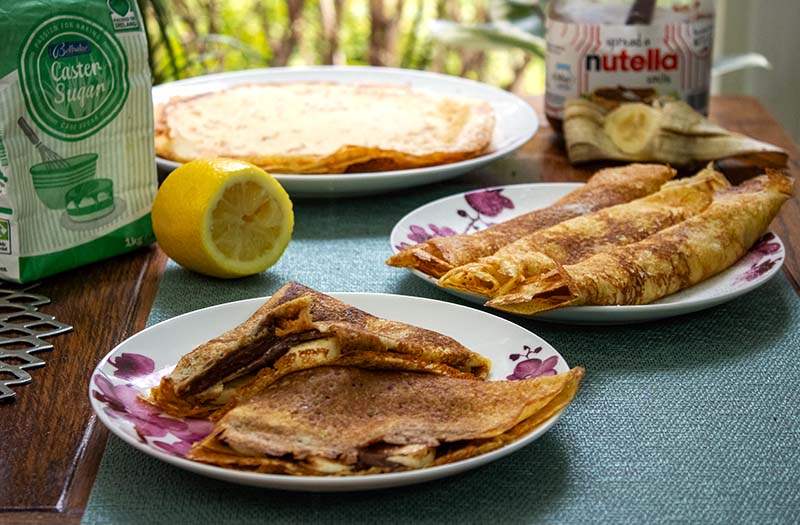 Gluten-free crepes with sugar and lemon and with nutella and banana