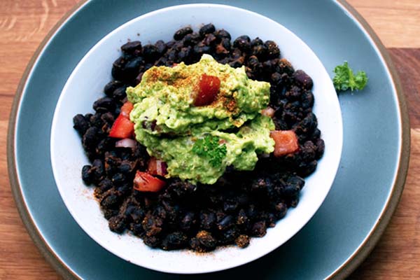 Bowl of guacamole with tortilla chips