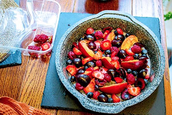 Summer fruit in a cake tin