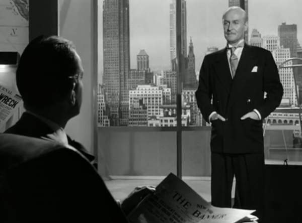 Ellsworth Toohey talking to Gail Wynand in his office